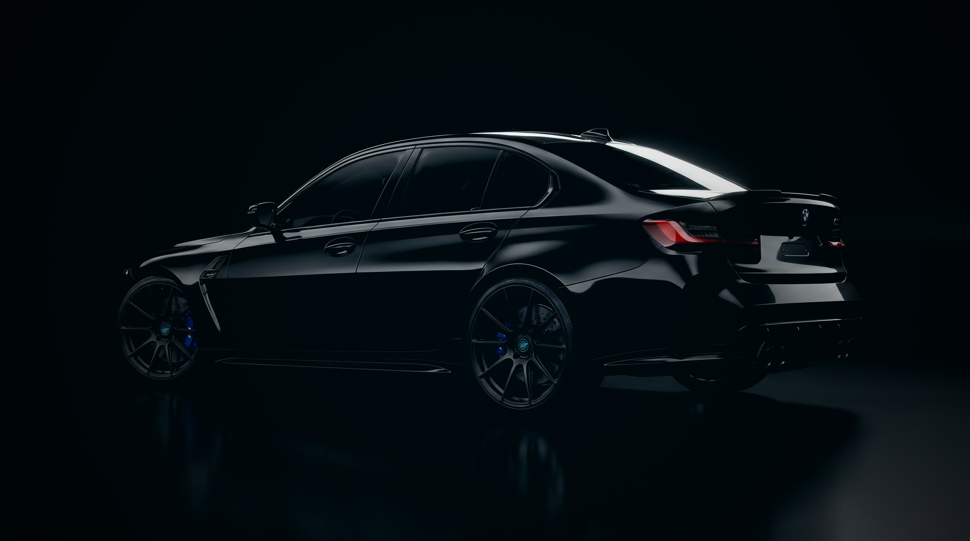 BMW M3 in motion at dusk on a wet mountain pass
